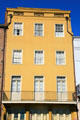 Heritage yellow building on Decatur St. near St. Louis St. New Orleans, LA.