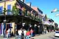 Bourbon Street bars seen from St. Anne. New Orleans, LA.