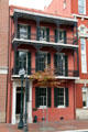 607 Saint Charles with cast iron galleries on Lafayette Square. New Orleans, LA.
