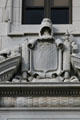 Helmet of liberty over E Pluribus Unum shield on U.S. Court of Appeals Building. New Orleans, LA.