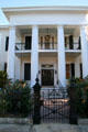 Pritchard-Pigott House with massive Greek columns in Garden District. New Orleans, LA.