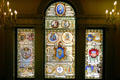 Stained glass window with historical seals of the state of Massachusetts in State House. Boston, MA.