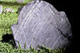 Death head on tombstone of Ebenezer Montfort in Old Granary Burial Ground. Boston, MA.