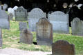 Tombstones with death heads in King's Chapel Burying Ground. Boston, MA.