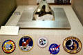 Moon rock & Apollo space mission shoulder patches in JFK Library. Boston, MA.
