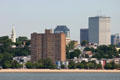 Skyline with white One Financial Center behind residences on Boston Bay. Boston, MA.