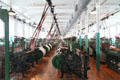 Rows of weaving machines at Boott Cotton Mills. Lowell, MA.