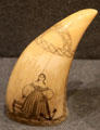 Scrimshaw figure of woman with anchor at New Bedford Whaling Museum. New Bedford, MA.