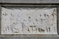 Relief carving of Pilgrims' Treaty with Native Americans on National Forefathers Monument. Plymouth, MA.
