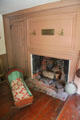 Cradle & fireplace at Jabez Howland House. Plymouth, MA.