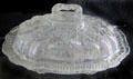 Pressed glass lacy princess-feather medallion design covered dish by Boston & Sandwich Glass Co. at Sandwich Glass Museum. Sandwich, MA.