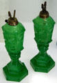 Star & punty pattern green glass kerosene lamps at Sandwich Glass Museum. Sandwich, MA.