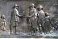 Bronze plaque showing Pilgrims on Founders' Memorial at Boston Common. Boston, MA.