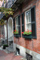 Beacon Hill brick row houses with flower boxes. Boston, MA.