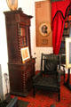 Longfellow's study with spreading chestnut tree armchair at Longfellow National Historic Site. Cambridge, MA.
