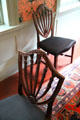 Federal-style chairs in parlor of Crowninshield-Bentley House of Peabody Essex Museum. Salem, MA.