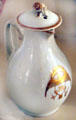 Porcelain chocolate pot used by John Adams with federal eagle symbol bearing JA initials at Peacefield. Quincy, MA.