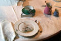 Dining room place setting with hand-painted plate at Gibson House Museum. Boston, MA.