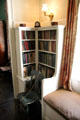 Corner book shelves in hallway at Nichols House Museum. Boston, MA.