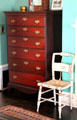 Dresser by Thomas Seymour of Boston & stenciled Hitchcock side chair in front bedroom at Nichols House Museum. Boston, MA.