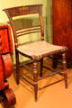 Painted side chair with rush seat from Boston owned by Henry David Thoreau's family at Concord Museum. Concord, MA.