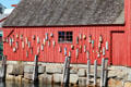 Collection of floats on town's signature building. Rockport, MA.