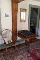Parlor with Windsor chair & lap desk on table at Rev. John Hale House. Beverly, MA.