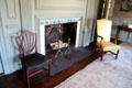 Upstairs sitting room fireplace & chairs at Jeremiah Lee Mansion. Marblehead, MA.
