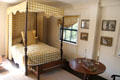 Small bedroom with four-poster & trundle beds at Jeremiah Lee Mansion. Marblehead, MA.