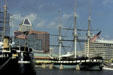 USS Constellation against Baltimore skyline. Baltimore, MD.