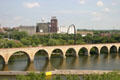 Stone Arch Bridge & Pillsbury flour mill on Mississippi River. Minneapolis, MN