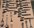 Collection of spoons by Bert Bull made by Eisenstadt from St Louis World's Fair at Missouri History Museum. St. Louis, MO.