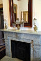Fireplace with girandoles at Vaile Mansion. Independence, MO.