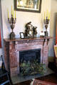 Fireplace with mantle clock at Vaile Mansion. Independence, MO.