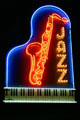 Neon sign of piano & sax for jazz club at American Jazz Museum. Kansas City, MO.