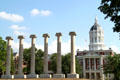 Column ruins of Academic Hall with Jesse Hall on quad of University of Missouri. Columbia, MO.