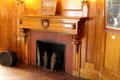 Living room fireplace with bear andirons of Charles W. Clark Chateau. Butte, MT.