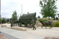 Sculpted covered wagon at Wagon Trail Monument. Omaha, NE.