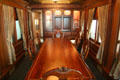 Antique dining table in Union Pacific private passenger car at Durham Western Heritage Museum. Omaha, NE.