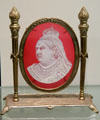 Cameo cut glass portrait relief of Queen Victoria on gilded metal stand by Thomas Webb & Sons of Stourbridge, England at Currier Museum of Art. Manchester, NH.