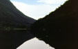 Profile Lake below the now disappeared Old Man of the Mountains at Franconia Notch. NH.