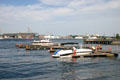 Boats on Piscataqua River with Portsmouth Naval Shipyard on far bank. Portsmouth, NH.