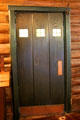 Arts & Crafts oak door to dining room at Stickley Museum at Craftsman Farms. Morris Plains, NJ.