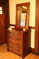 Oak & iron chest of drawers #621 & oak mirror by United Crafts of Eastwood, NY at Gustav Stickley Museum at Craftsman Farms. Morris Plains, NJ.