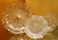 New England pressed glass plates used lacy pattern to hide imperfections at Museum of American Glass. Milville, NJ.