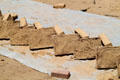 Adobe bricks being dried for restoration project at San Miguel Mission. Santa Fe, NM.