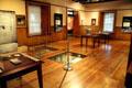 Gallery in Palace of Governors section of New Mexico History Museum with foundations revealed. Santa Fe, NM.