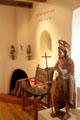 St. John the Baptist Mexican sculpture , leather chair & gallery in Museum of Spanish Colonial Art. Santa Fe, NM.