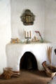 Corner fireplace in Mora house at Rancho de las Golondrinas. Santa Fe, NM.