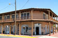 Beveled corner building with veranda on Old Town Square. Albuquerque, NM.